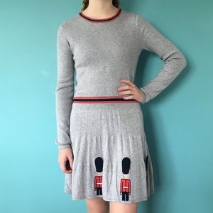 Grey sweater dress with English guards on bottom
